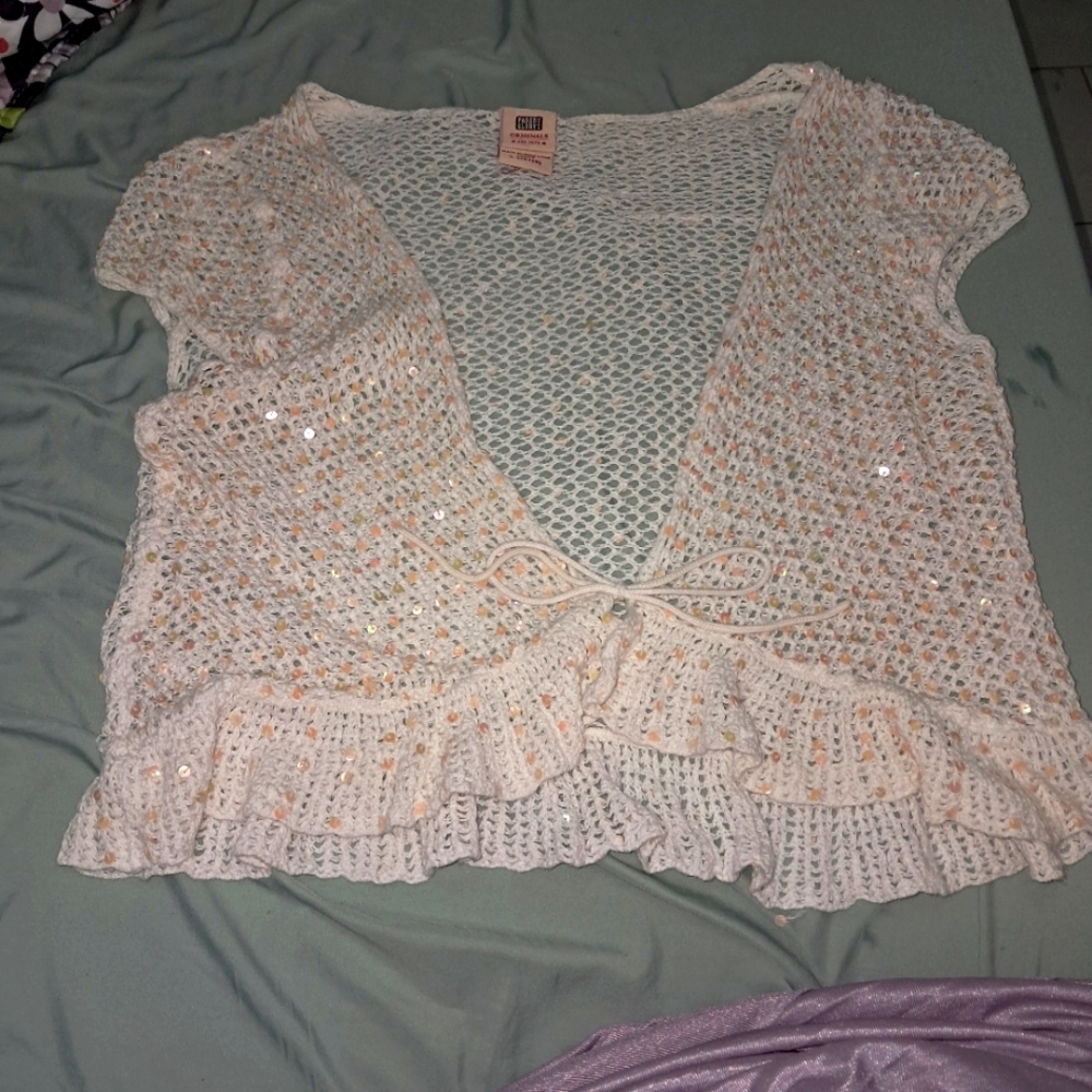 White Crochet & Sequins Cover Up. It Ties In The Front Cap Sleeves.
